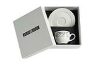 A coffee cup in a gift box - Verse VI
